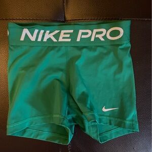 green nike pros! size XS!